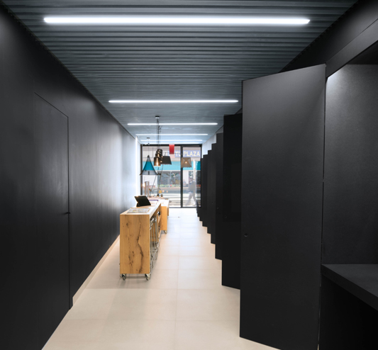 An open-plan, elegant and functional office exists